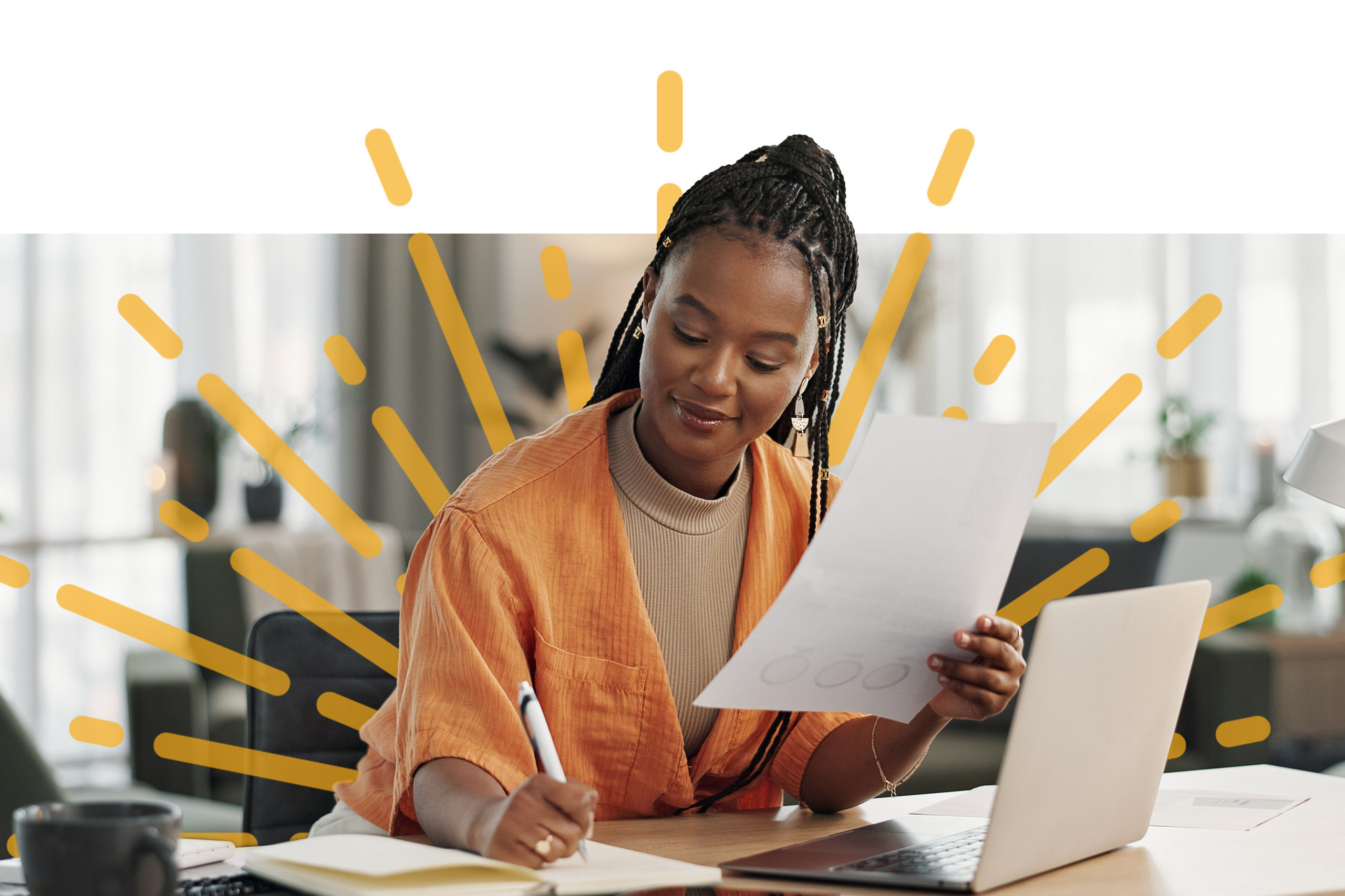 A woman taking notes on her notebook